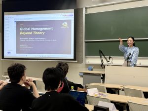 Rachel Leng delivering a guest lecture on global leadership at Soka University